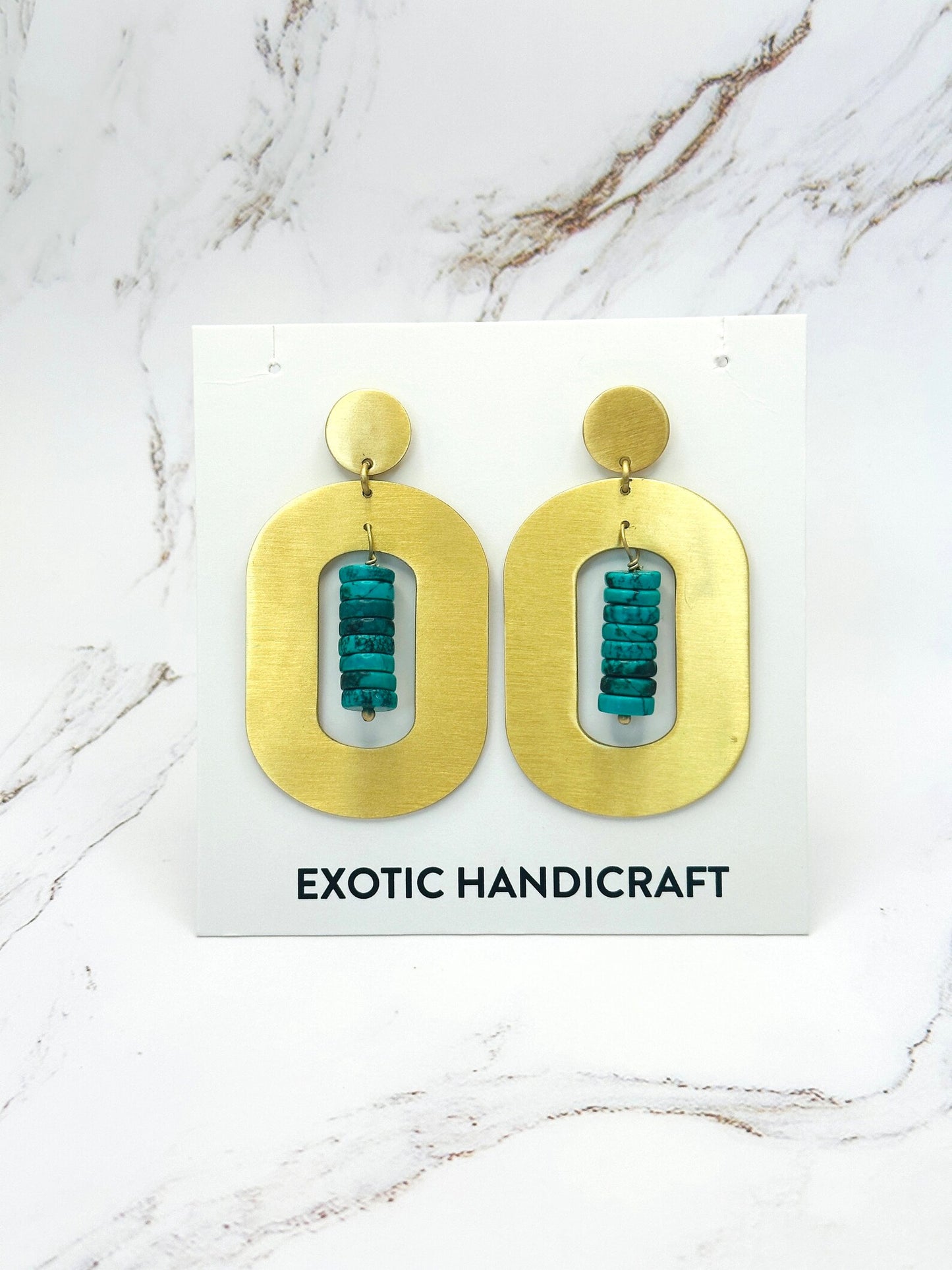 Ringing Turquoise Stone with Modern Gold Dangling Earrings